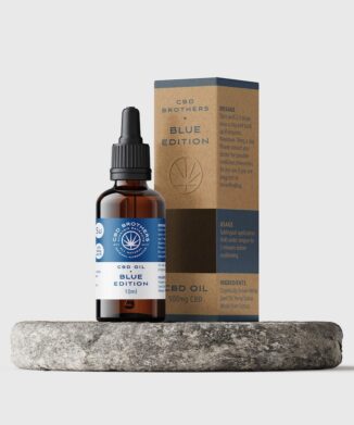 Premium CBD Brothers blue edition CBD oil bottle and packaging on circular plinth