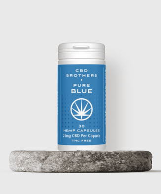 CBD Brothers pure blue CBD capsules on stone plinth