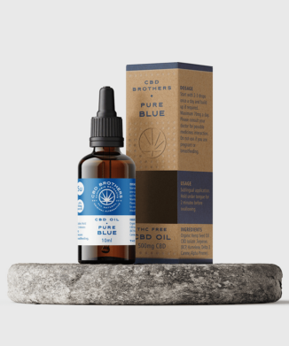 Premium CBD Brothers pure blue CBD oil bottle and packaging on circular plinth
