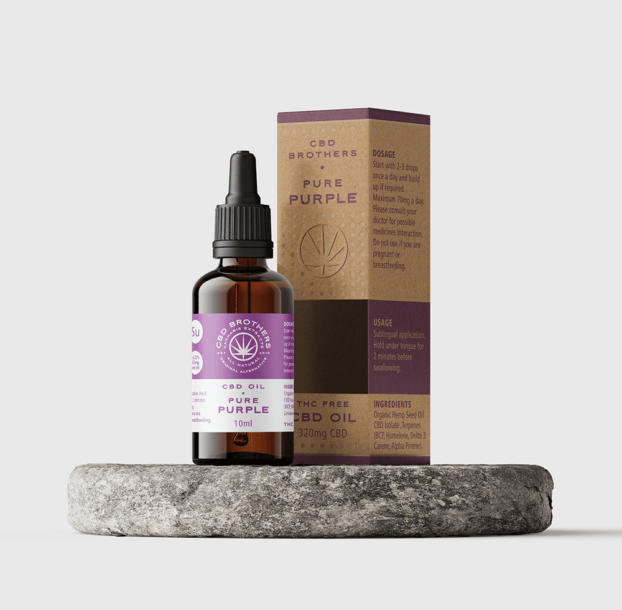 Premium CBD Brothers pure purple CBD oil bottle and packaging on circular plinth