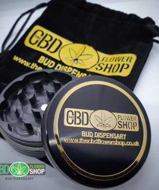 The CBD Flower Shop black metal tea grinder with gift bag