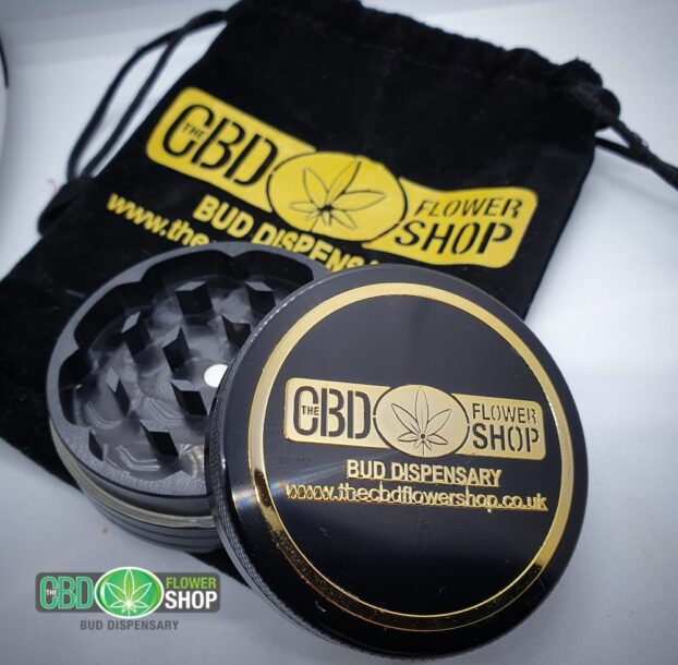 The CBD Flower Shop black metal tea grinder with gift bag