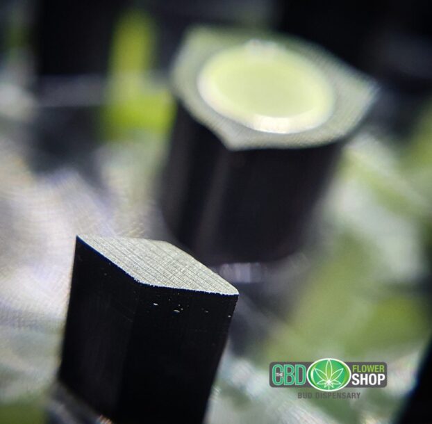 The CBD Flower Shop black metal tea grinder