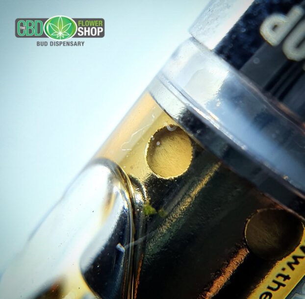 Close up of CBD vape cartridge with oil inside