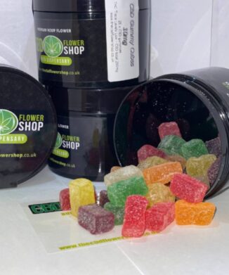 Fruity Cubes CBD Gummies spilling out of pot