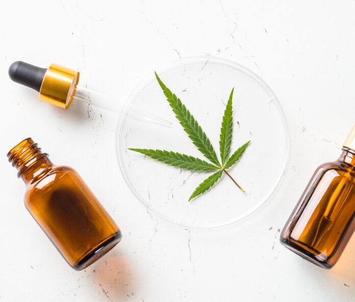 CBD oil and leaf