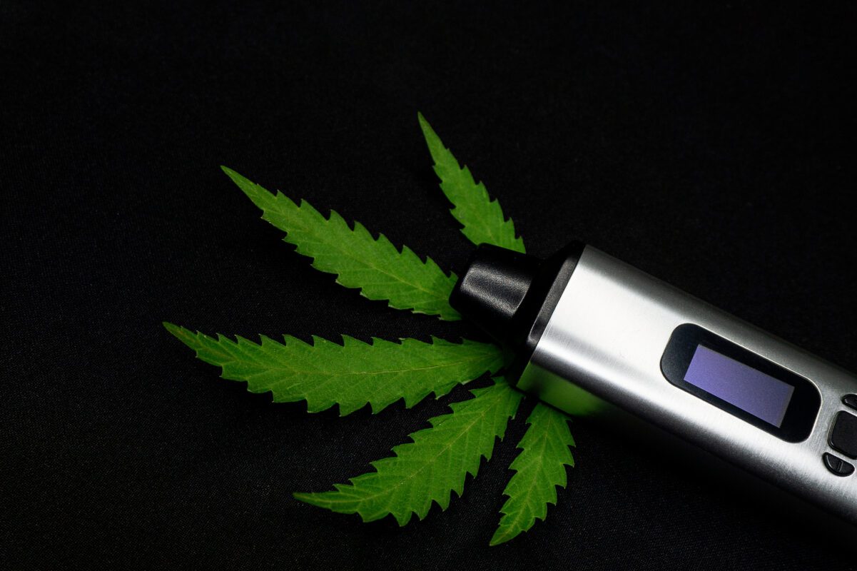 CBD vape with cannabis leaf