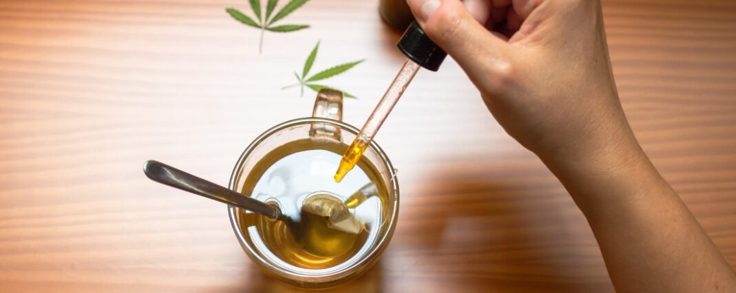 CBD oil being added to tea