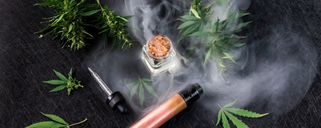 CBD vape and hemp plants with smoke effect feature image