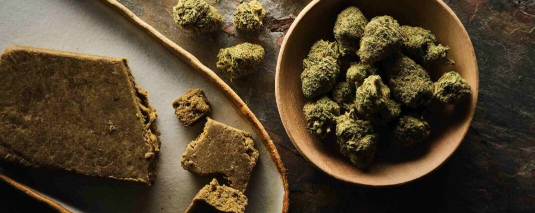 CBD concentrates in serving dishes on wooden table