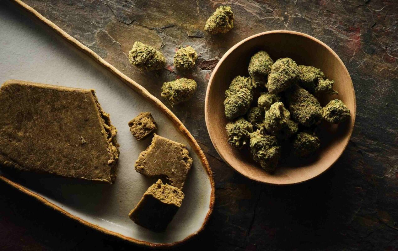 CBD concentrates in serving dishes on wooden table