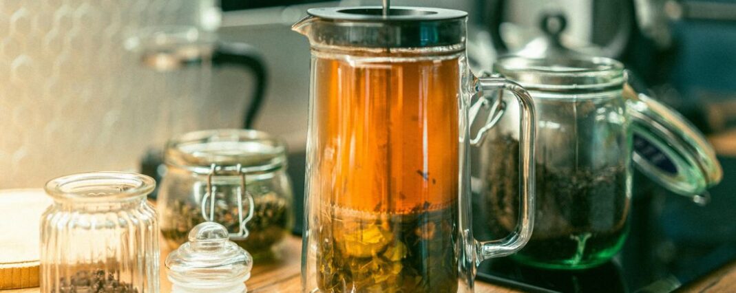 CBD tea brewing in cafetiere on kitchen counter