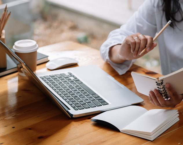 person at desk focused on work 