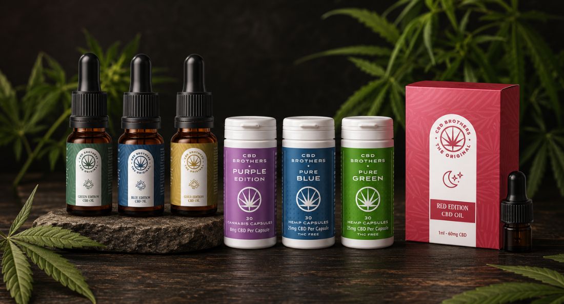 cbd brothers oils and capsules product range on a dark wood surface